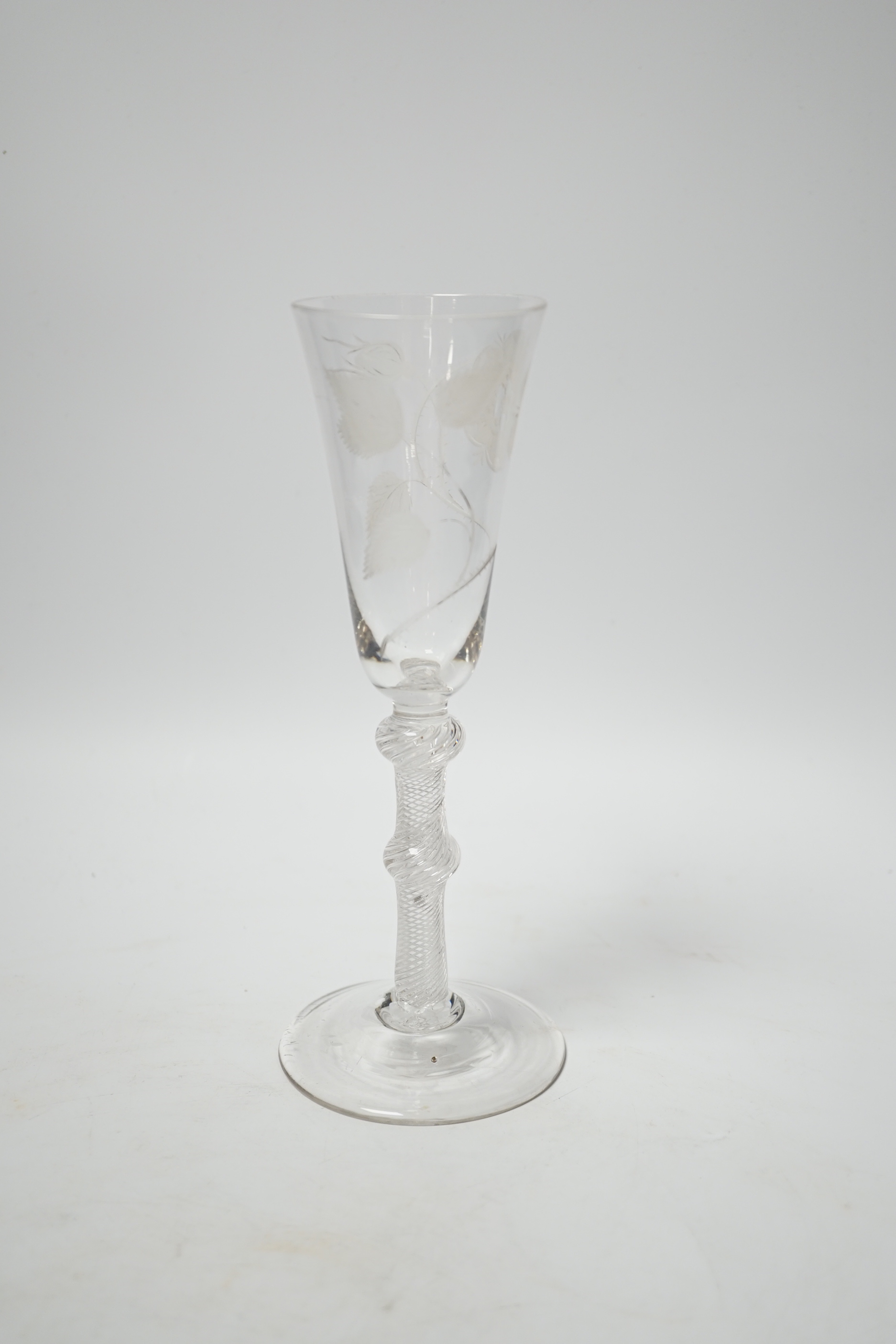 An 18th century Jacobite ale glass with double knop and air twist stem, engraved with a rose, 20.5cm